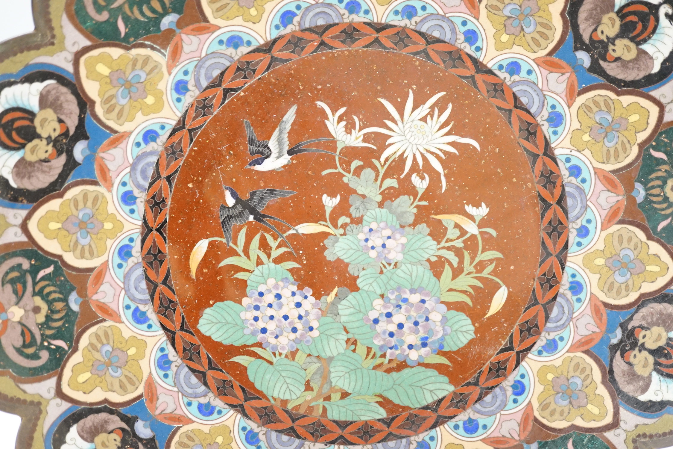 A pair of Japanese Meiji period petal rimmed cloisonné dishes, 37cm